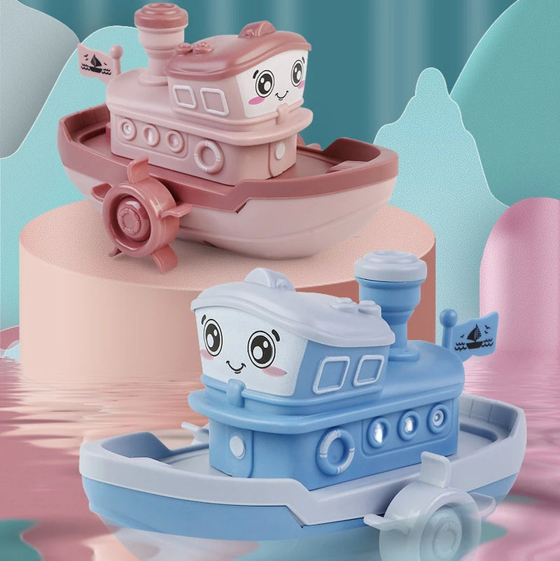 Brinquedo de banho infantil em forma de navio de desenho animado com corda.