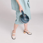 circular microfiber faux leather shoulder bag, view 7 - MRSLM