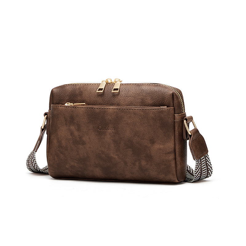 Elegante Crossbody-Handytasche mit farbigem Riemen – Kompakte Lederhandtasche