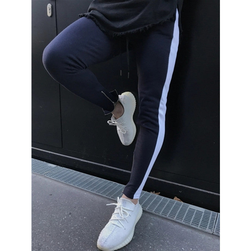Freizeit-Sporthose mit Patchwork-Farben und Reißverschluss