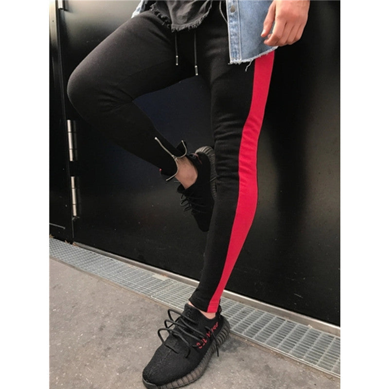 Freizeit-Sporthose mit Patchwork-Farben und Reißverschluss