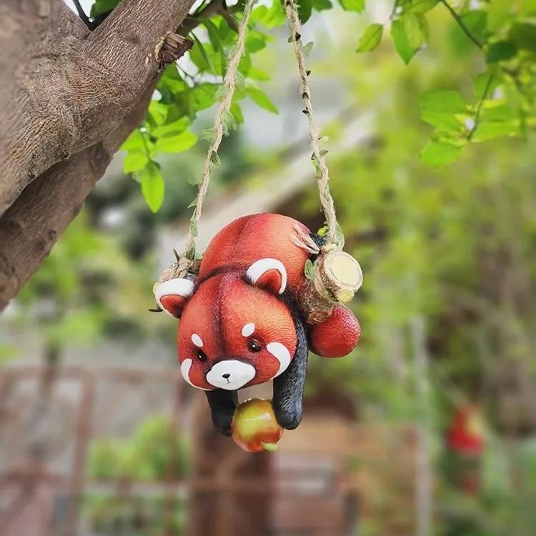 Resin raccoon statue climbing rope, view 7 - MRSLM