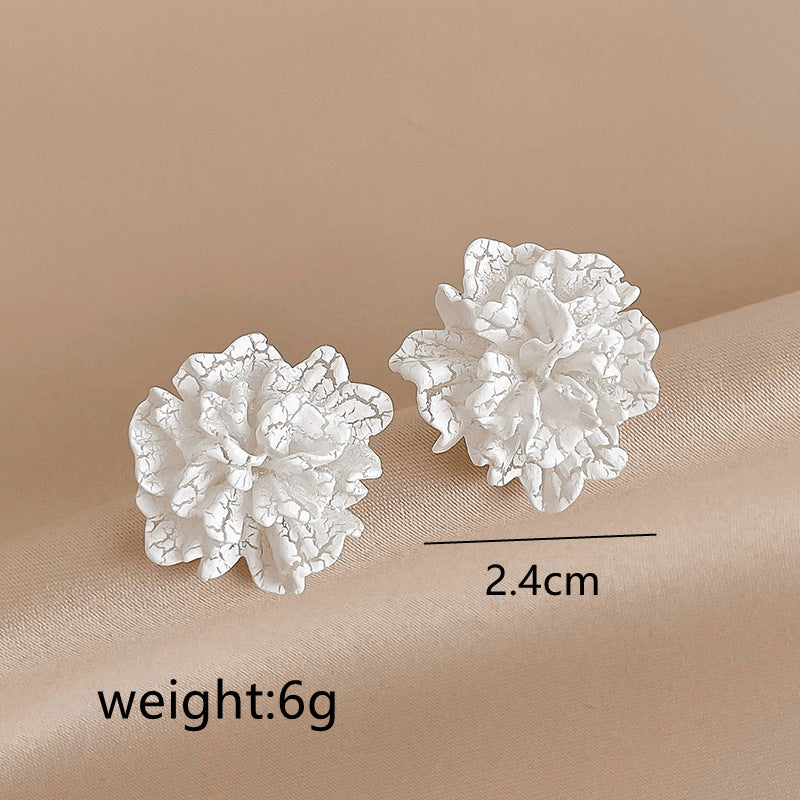 white floral stud earrings, view 6 - MRSLM