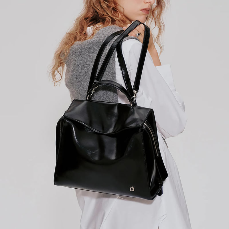 Mochila de viagem de couro de grande capacidade para homens e mulheres.
