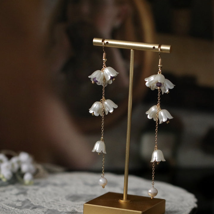 Brincos de orquídea sino vintage franceses