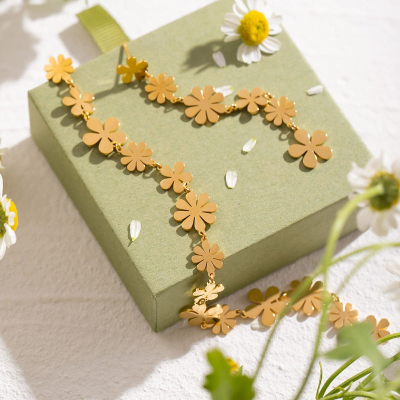 gold plated asymmetrical daisy earrings - MRSLM