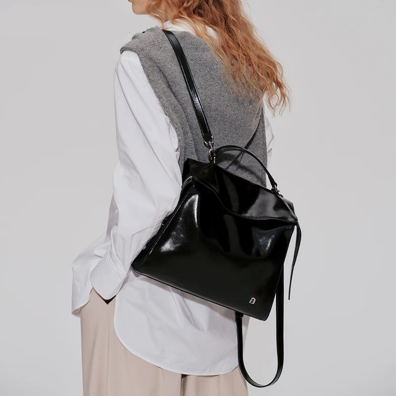 Mochila de viagem de couro de grande capacidade para homens e mulheres.