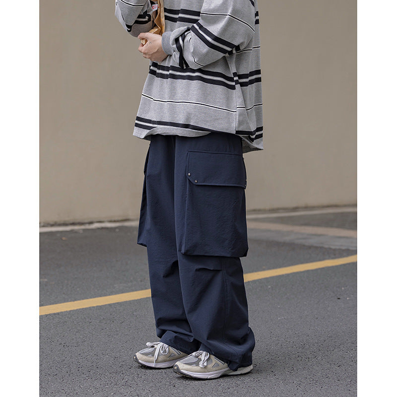 Calças legging vintage masculinas e femininas com cordão e bolsos grandes.