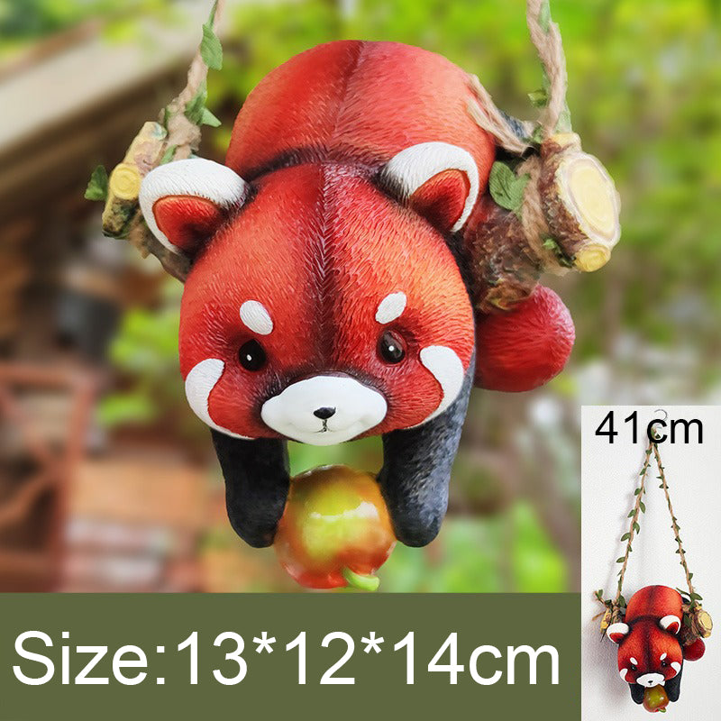 Resin raccoon statue climbing rope, view 2 - MRSLM