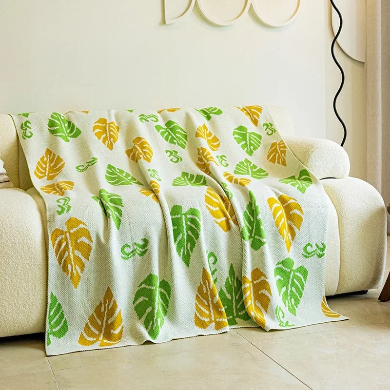 Manta de tricô luxuosa com estampa de folhas