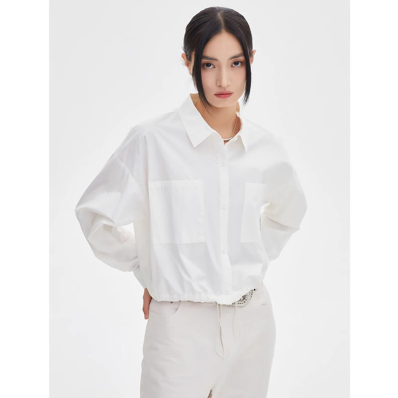 Blusa feminina de manga comprida com lapela e botões