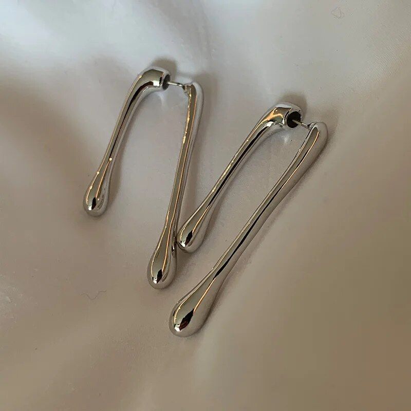 Brincos geométricos pendentes