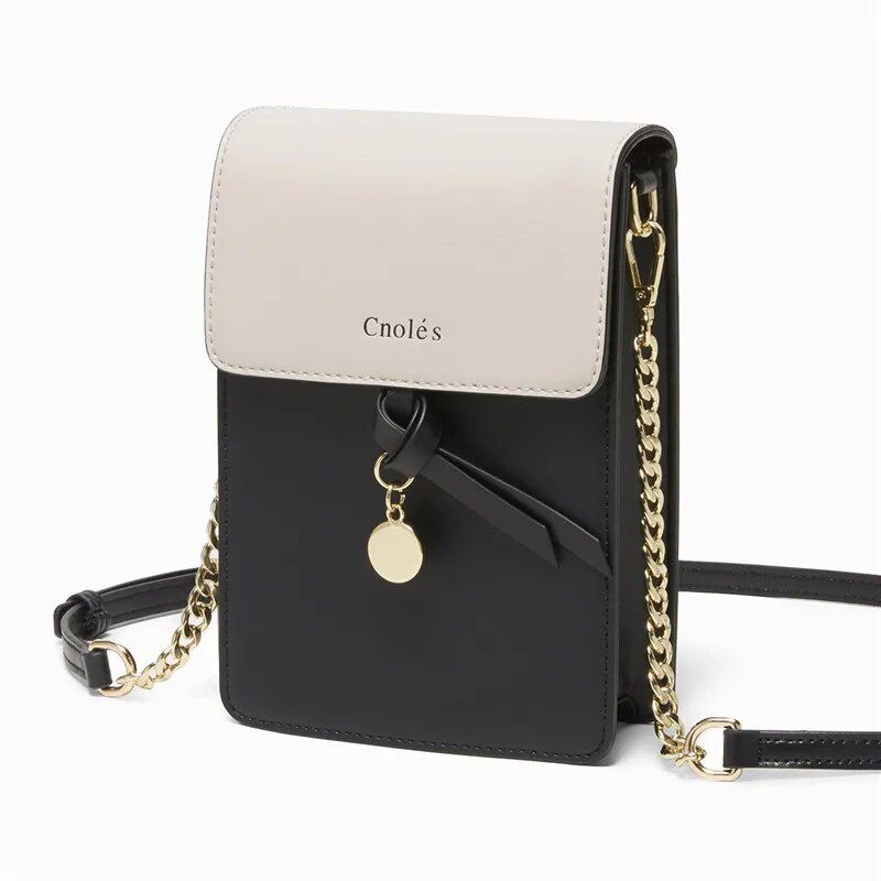 Bolsa transversal de couro elegante para celular com pingente.