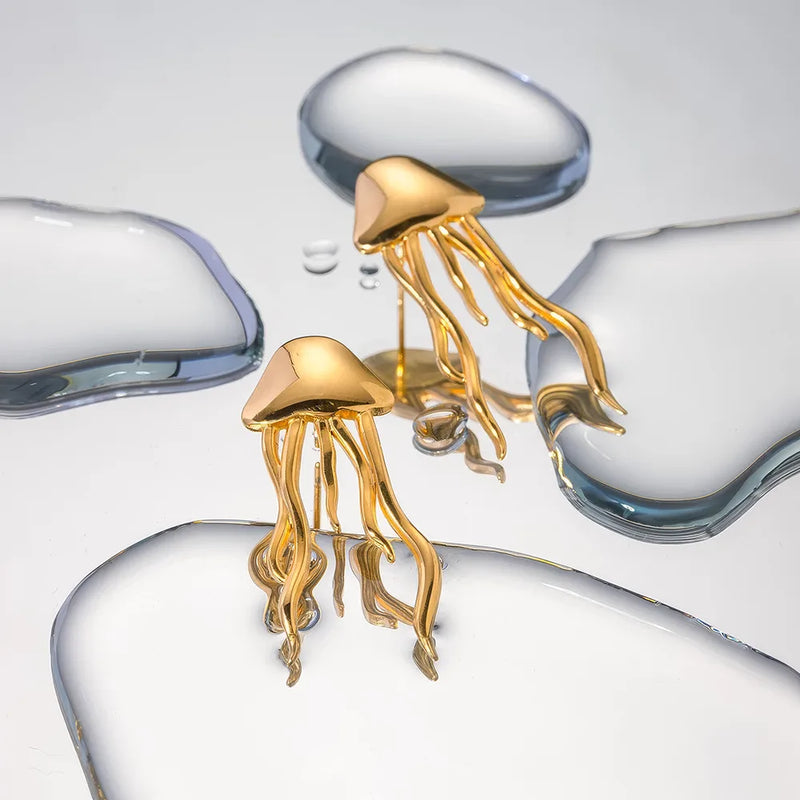 Ohrstecker in Quallenform, 18 Karat Gold.