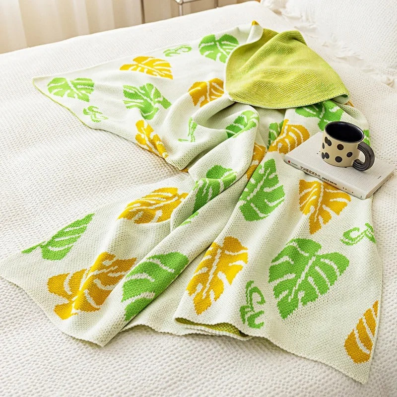 Manta de tricô luxuosa com estampa de folhas