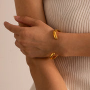 gold stainless steel wavy cuff bracelet, view 4 - MRSLM