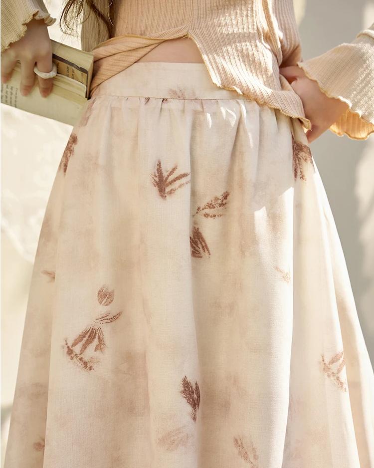 Saia evasê floral de primavera com cintura alta e estampa floral.