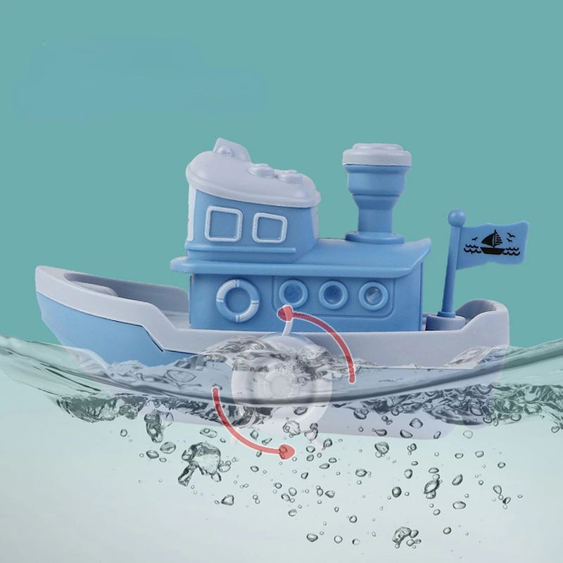 Brinquedo de banho infantil em forma de navio de desenho animado com corda.