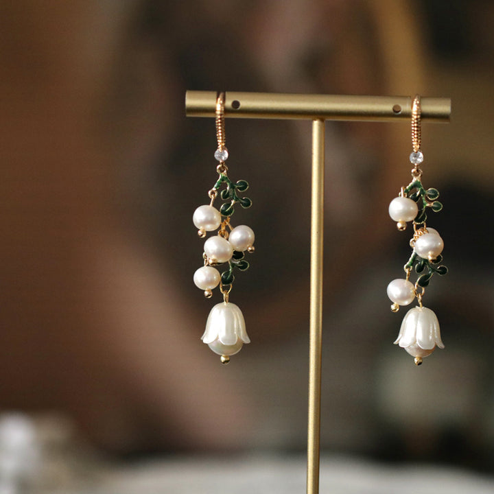 Brincos de orquídea sino vintage franceses