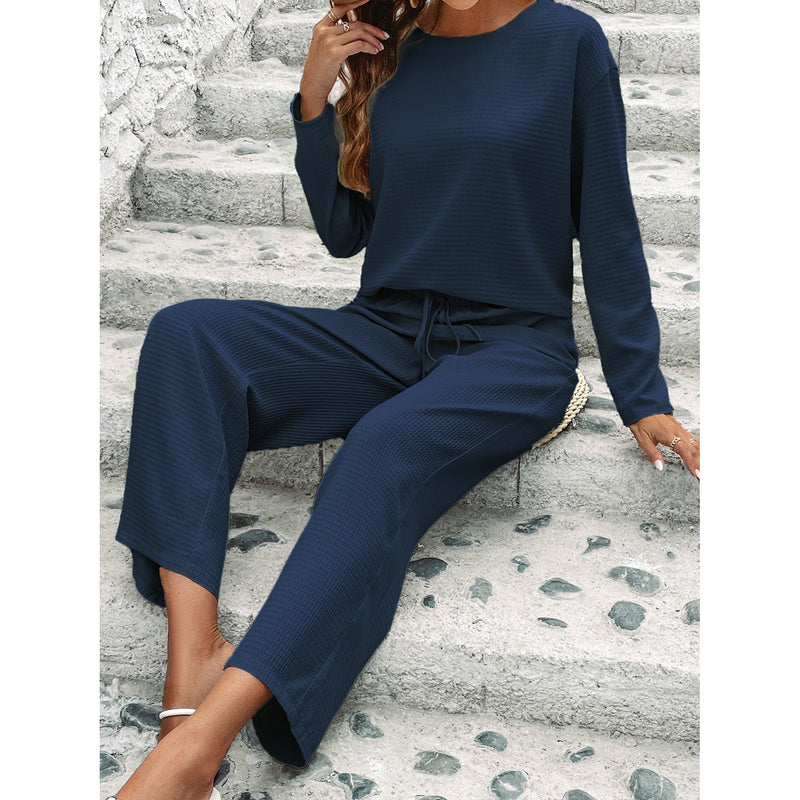 Conjunto de duas peças com blusa de manga comprida e calça social