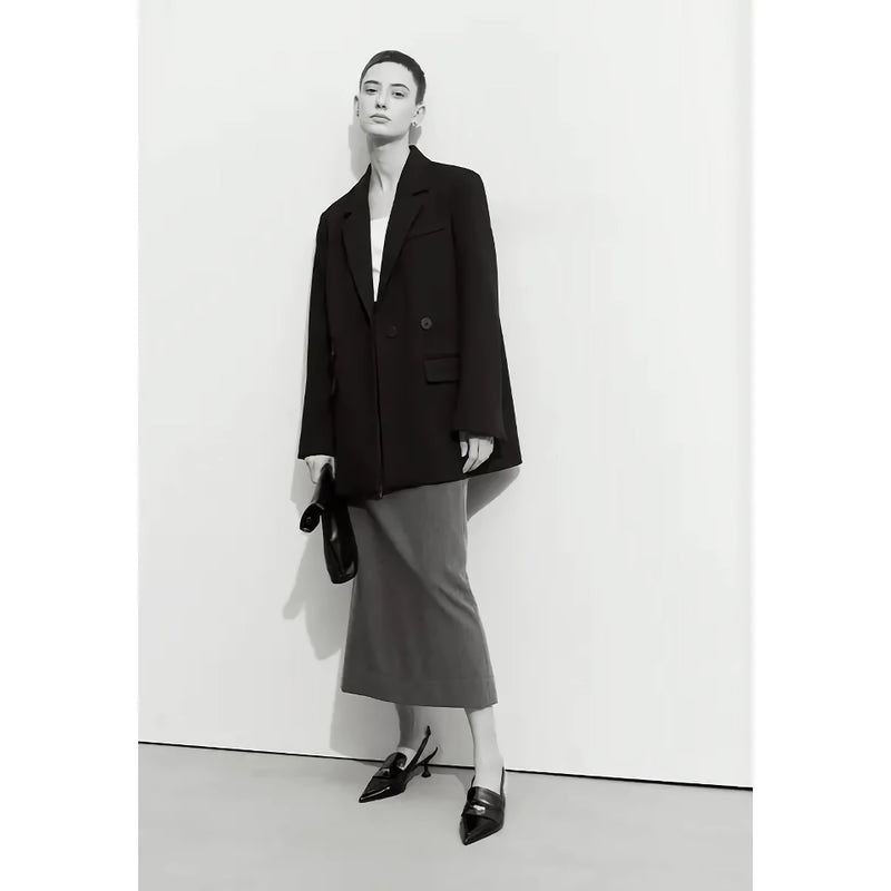 Blazer elegante de outono com abotoamento duplo e gola entalhada.