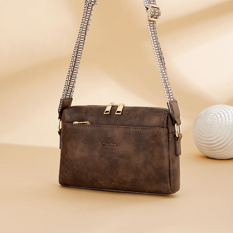 Elegante Crossbody-Handytasche mit farbigem Riemen – Kompakte Lederhandtasche