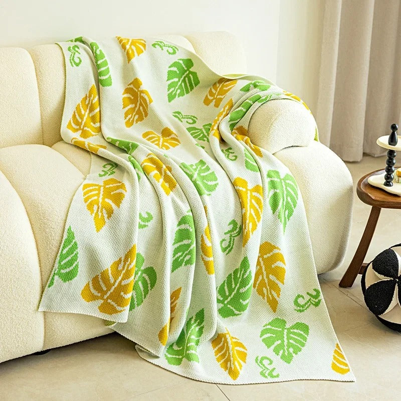 Manta de tricô luxuosa com estampa de folhas