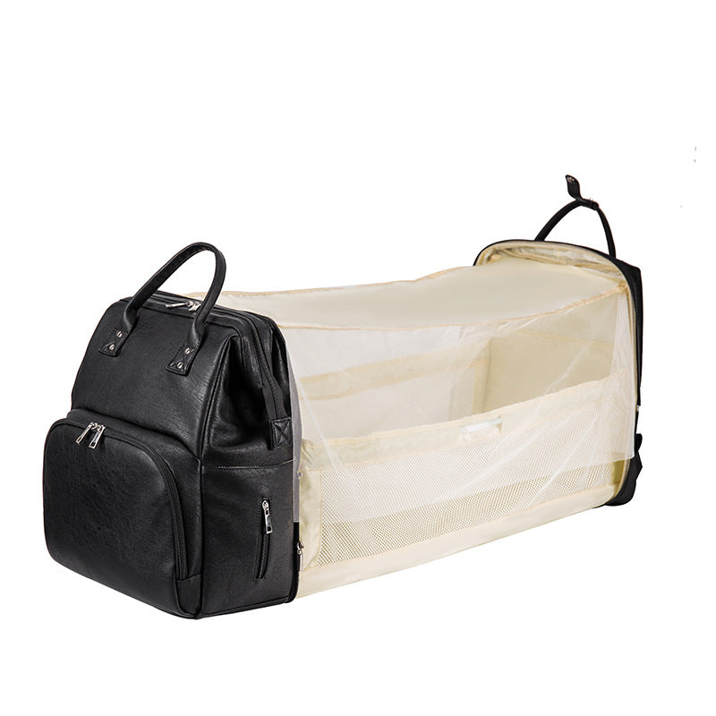 Mochila dobrável multifuncional para mãe e bebê, ideal para berço.