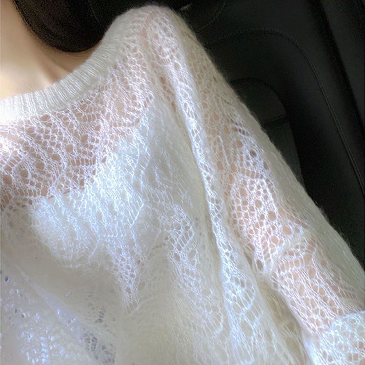Suéter feminino folgado e modelador para o verão.