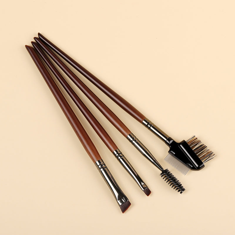 Conjunto de 4 pincéis angulares para sobrancelha e delineador com cabo de madeira.