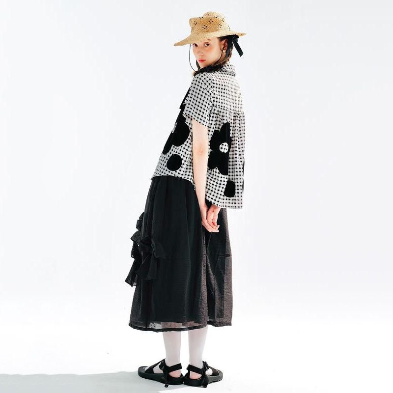 Eleganter schwarzer A-Linien-Midirock mit Schleife