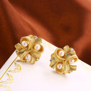women's pearl ribbon stud earrings, view 3 - MRSLM