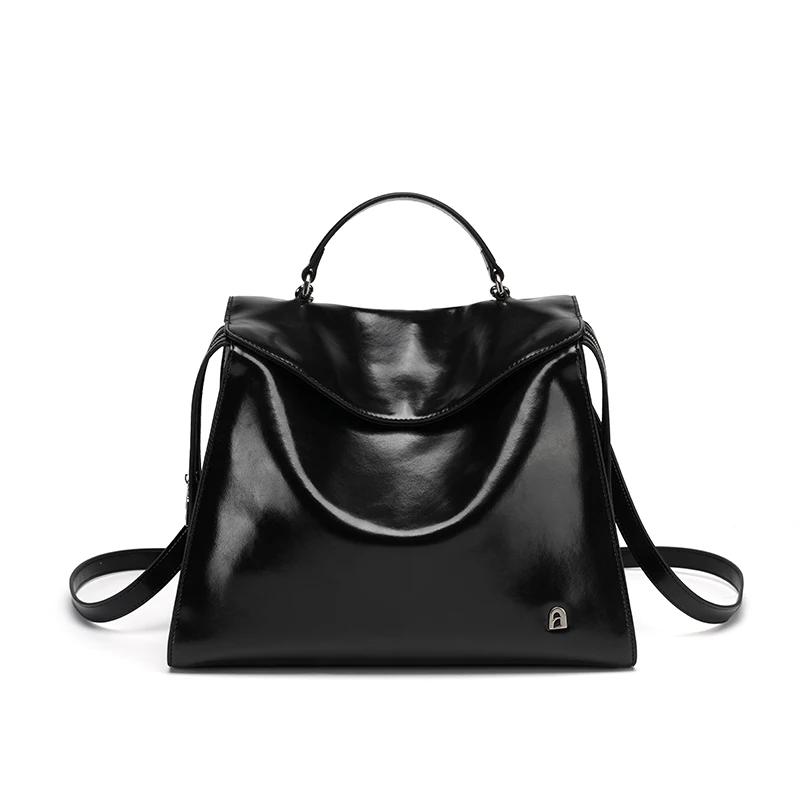 Mochila de viagem de couro de grande capacidade para homens e mulheres.