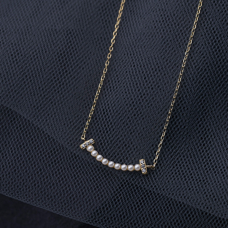 Colar feminino em prata de lei com pingente de carinha sorridente