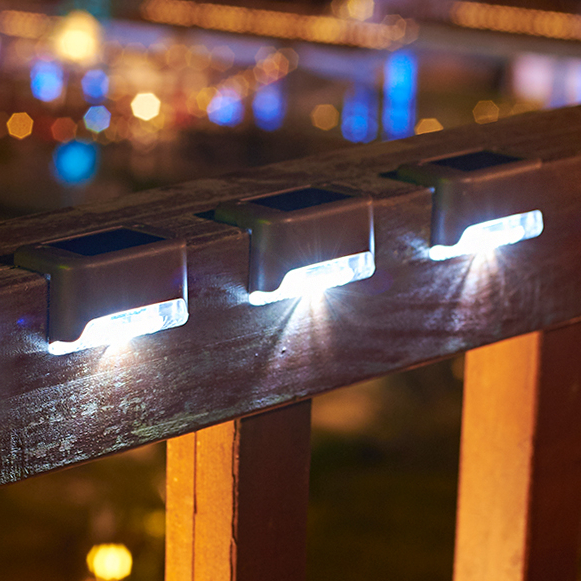 4-Pack Solar-Powered LED Fence Wall Lights for Outdoor Garden Pathways and Decks