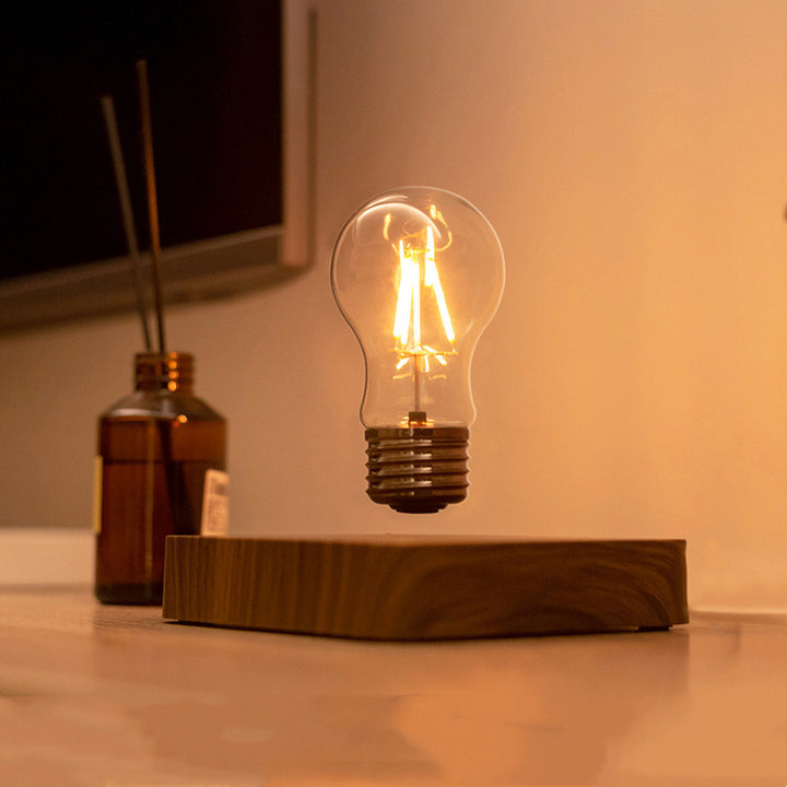 Creative Minimal Self-rotating Wireless Powered Maglev Bulb