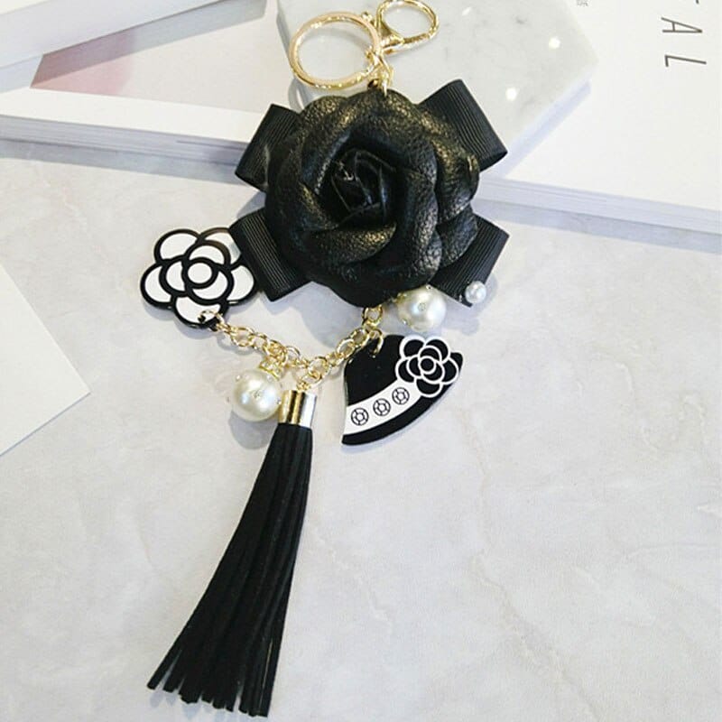Luxuriöser Schlüsselanhänger mit Rose aus schwarzem/weißem Leder für Damen